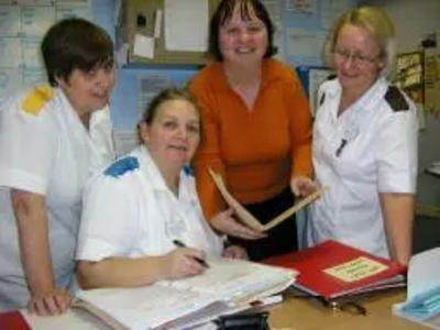 Jacquie Bell with group of hospital nurses